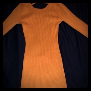 Yellow dress, comes down to the knees